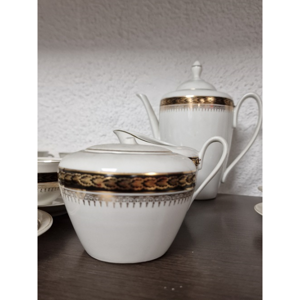 Juego de café dorado y negro