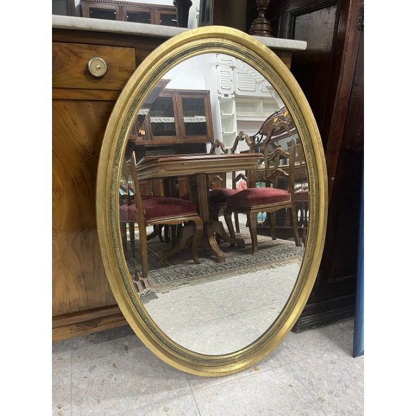 Espejo ovalado dorado